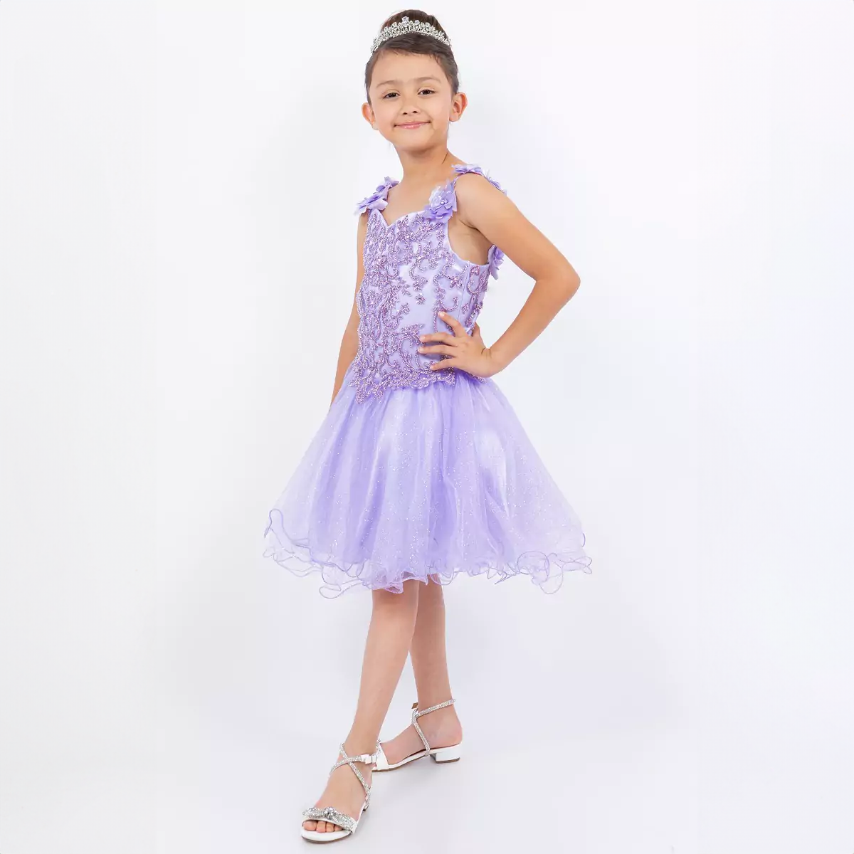 girl wearing a lilac sequin, lace and soft tulle party dress