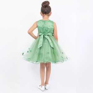 pretty model swirling in sage Green Party dress