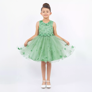 pretty model swirling in sage Green Party dress
