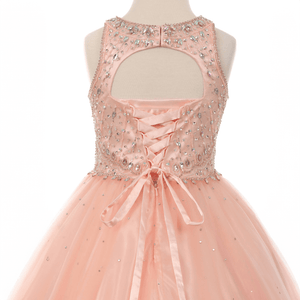 ribbon tie on the back of a blush coloured dress