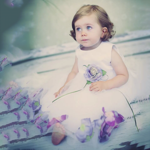 baby girl in petal dress