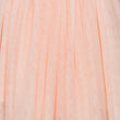 Close-up of light blush tulle fabric