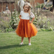 young girl posing in grounds