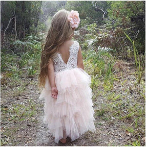 Girl in woods wearing Sleeveless Bohemian Spirit Dress in Ice White