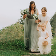 Wedding party with flower girl in ivory dress