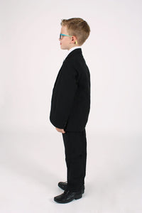 Young boy wearing black suit
