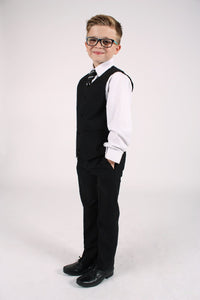 Boy wearing the black suit showing waistcoat