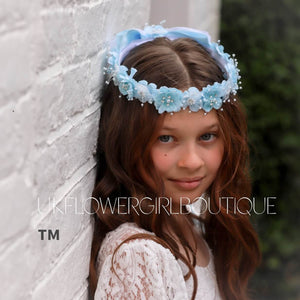 girl wearing blue flower crown