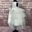 Side image of dark whit occasion dress