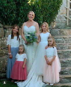 Pretty young flower girls with bride