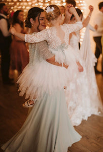 Lady with flower girl dancing