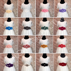 Various colours of Triple Flower Girl Waist / Sash Corsage on white dresses