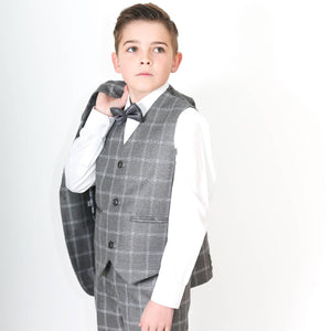 young boy modelling suit 