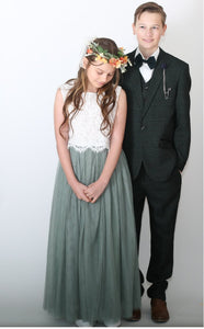 Young boy and flower girl in matching colours