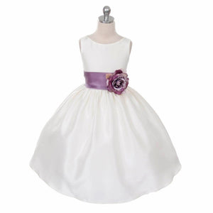 Morgan dress in white with purple sash on mannequin