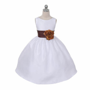 Morgan dress in white with brown sash on mannequin