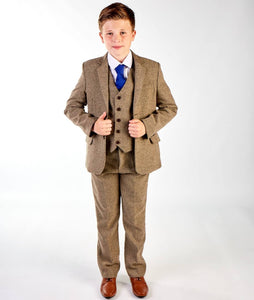 Boy wearing his suit and jacket