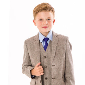boy wearing bron herringbone waistcoat and jacket