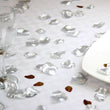 Silver petals scattered on a table