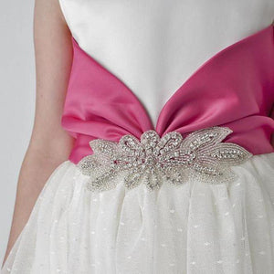 waistband of girls pink and white dress