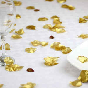 gold petals scattered over the table