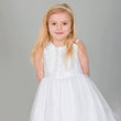 Girl wearing white Tiffany Flower Girl party dress