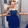 Girl wearing black ballerina style dress