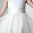 sash on white party dress