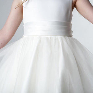 sash on white party dress